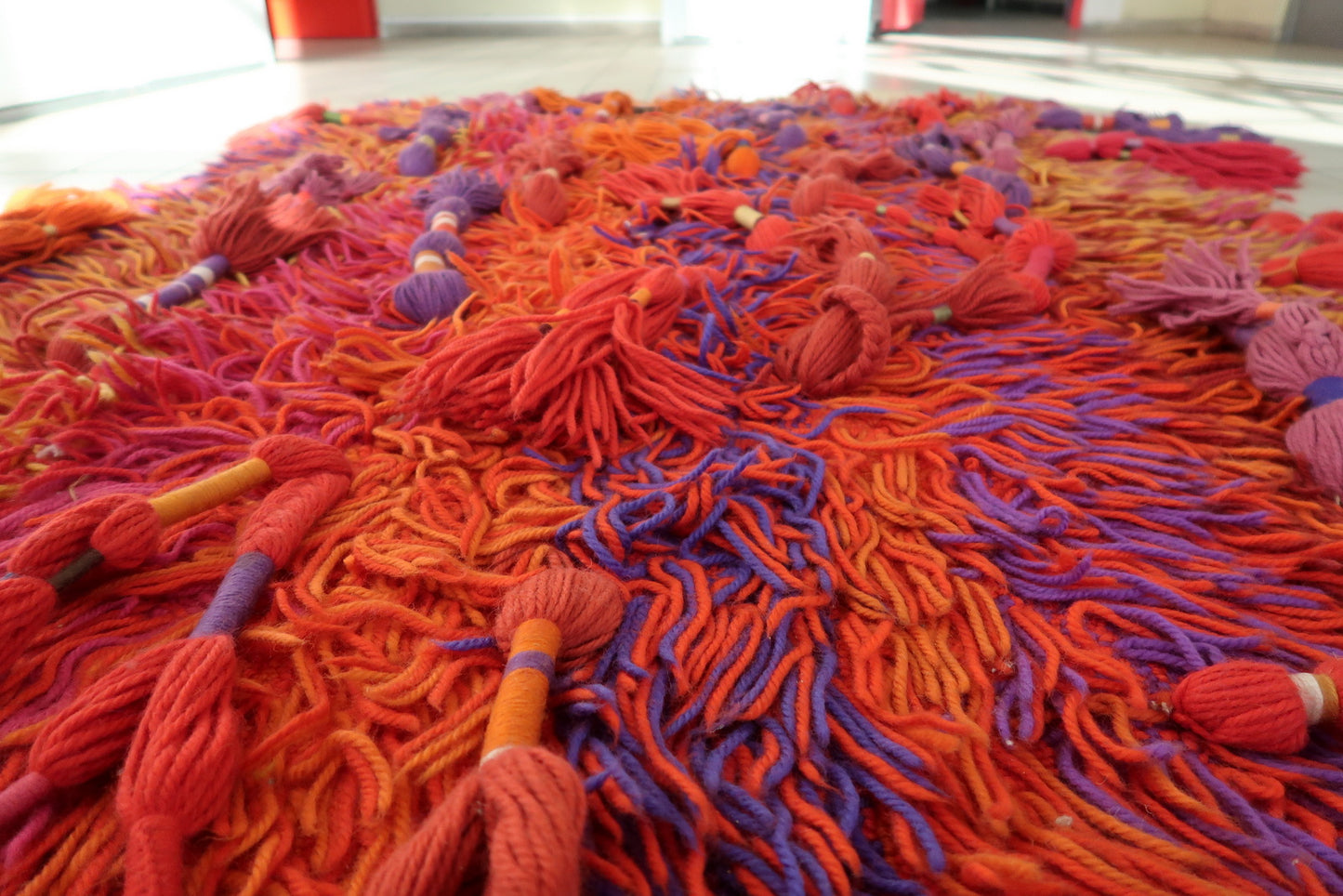 Handmade Rya rug from Sweden with soft shag pile and sunset colour field

