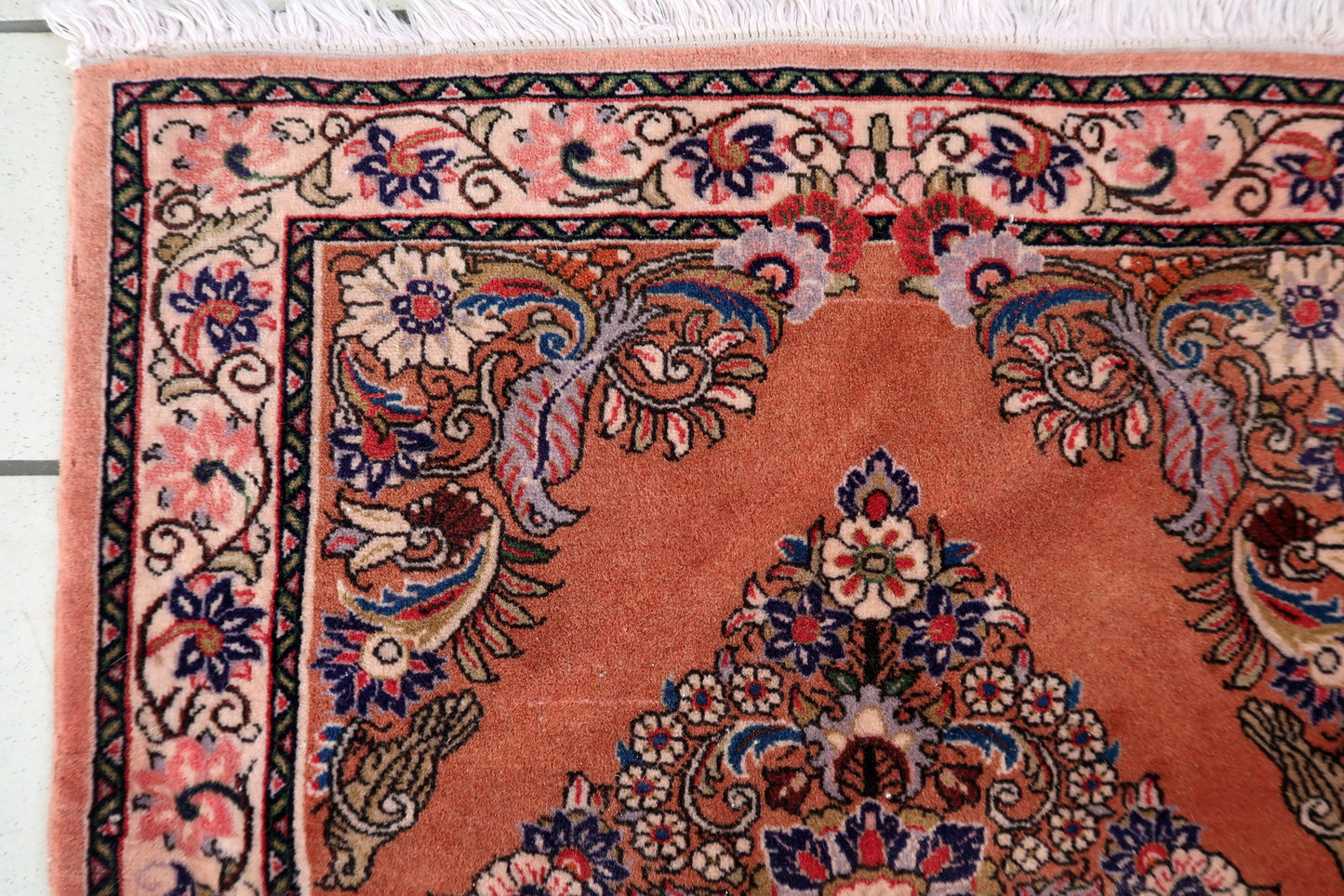 1950s Persian Sarouk rug with floral rosette medallion and scrolling boteh corners

