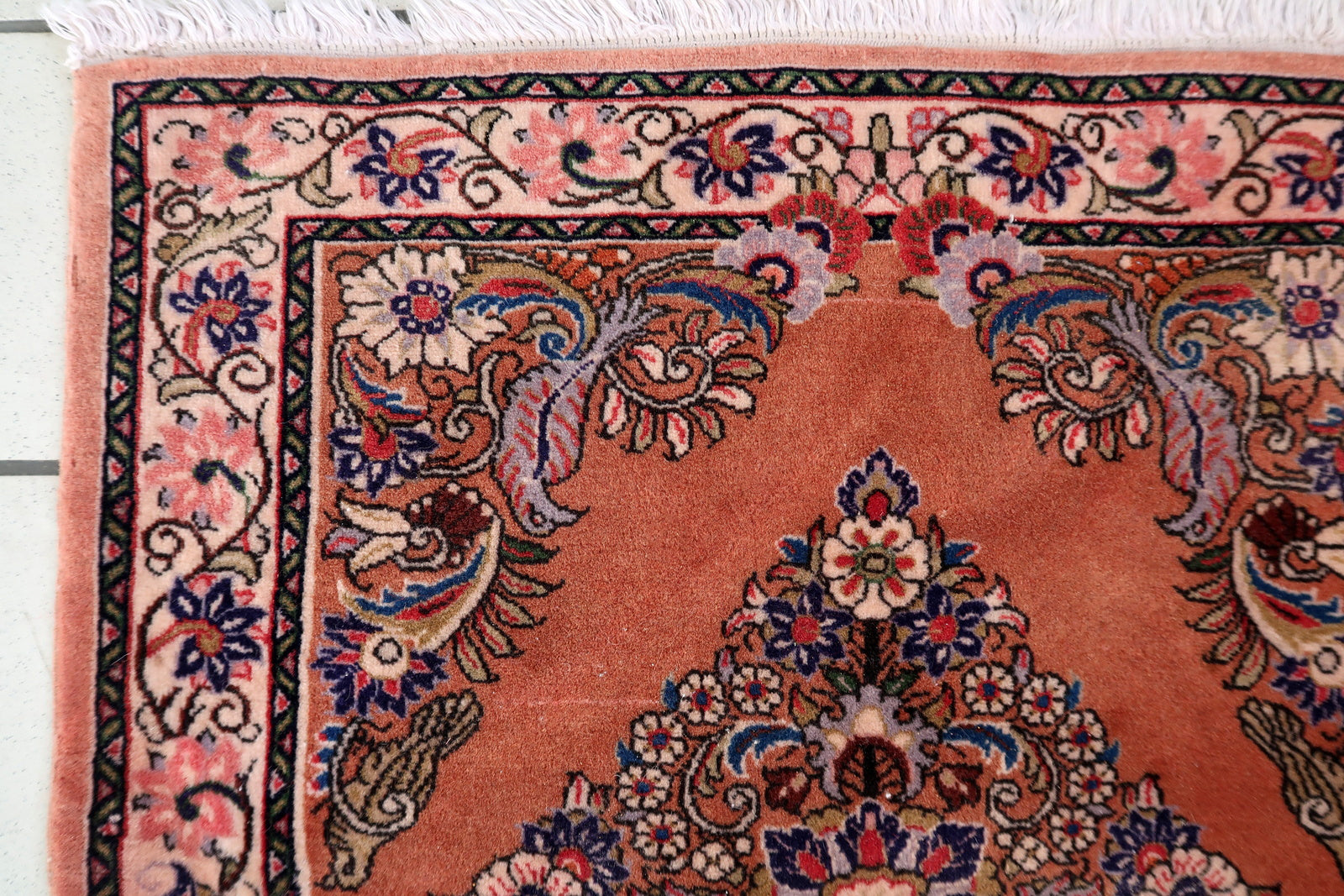 1950s Persian Sarouk rug with floral rosette medallion and scrolling boteh corners

