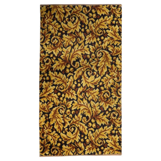 Vintage 1960s German acrylic area rug featuring rich gold and deep brown foliate scrollwork across a dense woven pile (Ref: 1C1287).