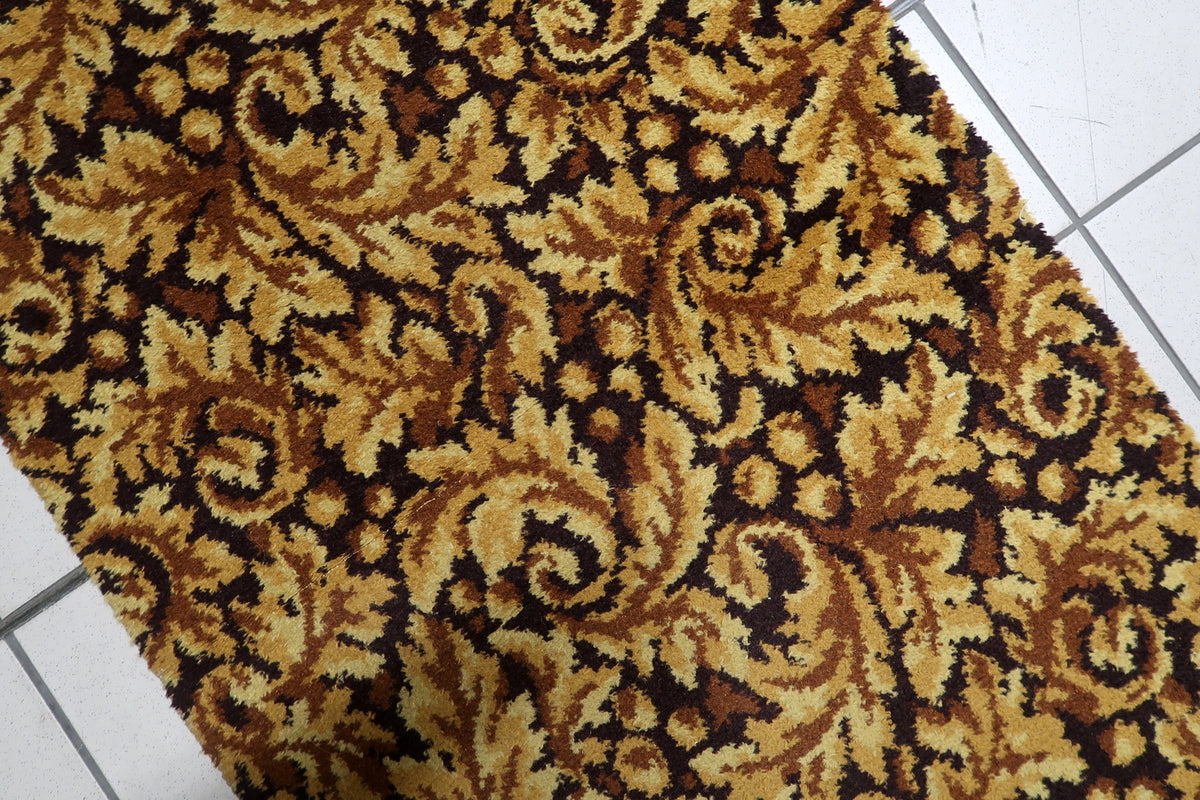 Mid-century German acrylic hallway runner with decorative foliate design in rich earth-tone colors
