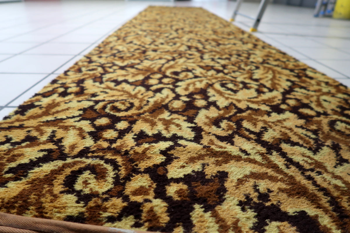 Narrow German acrylic runner from the 1960s with ornate botanical patterns and a golden background