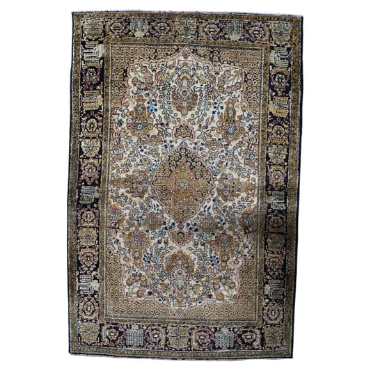 Vintage 1950s handmade Kashmir silk area rug with central medallion and intricate floral motifs in rich jewel tones (Ref: 1C1293).