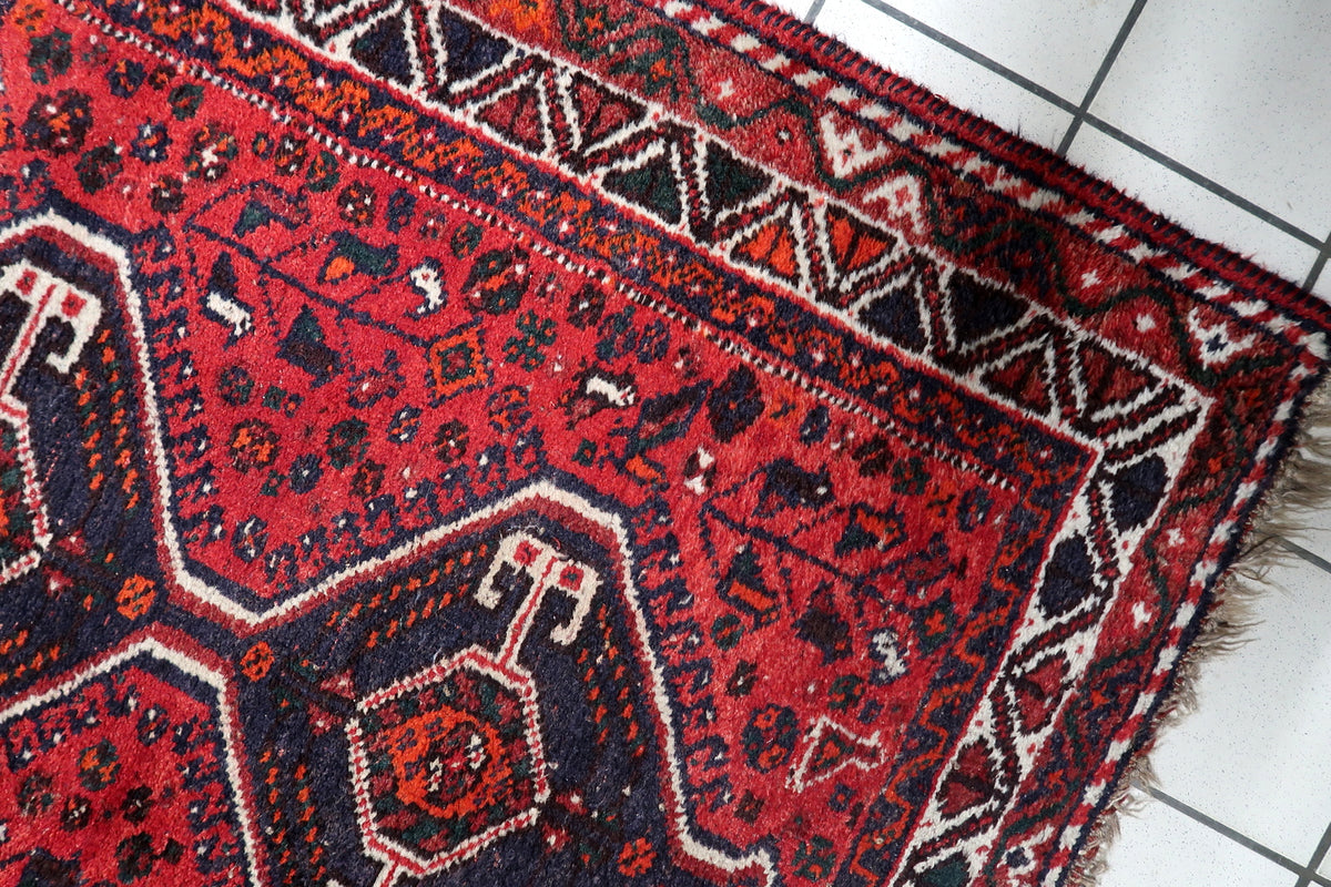 Hand-spun wool pile woven with rich natural vegetable dyes and authentic vintage abrash color variations.