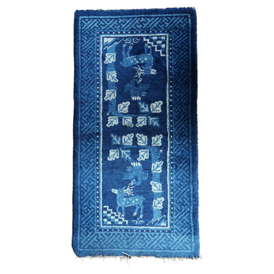 Full view of antique Chinese PaoTao rug 1C1306 with paired deer and blue fretwork borders