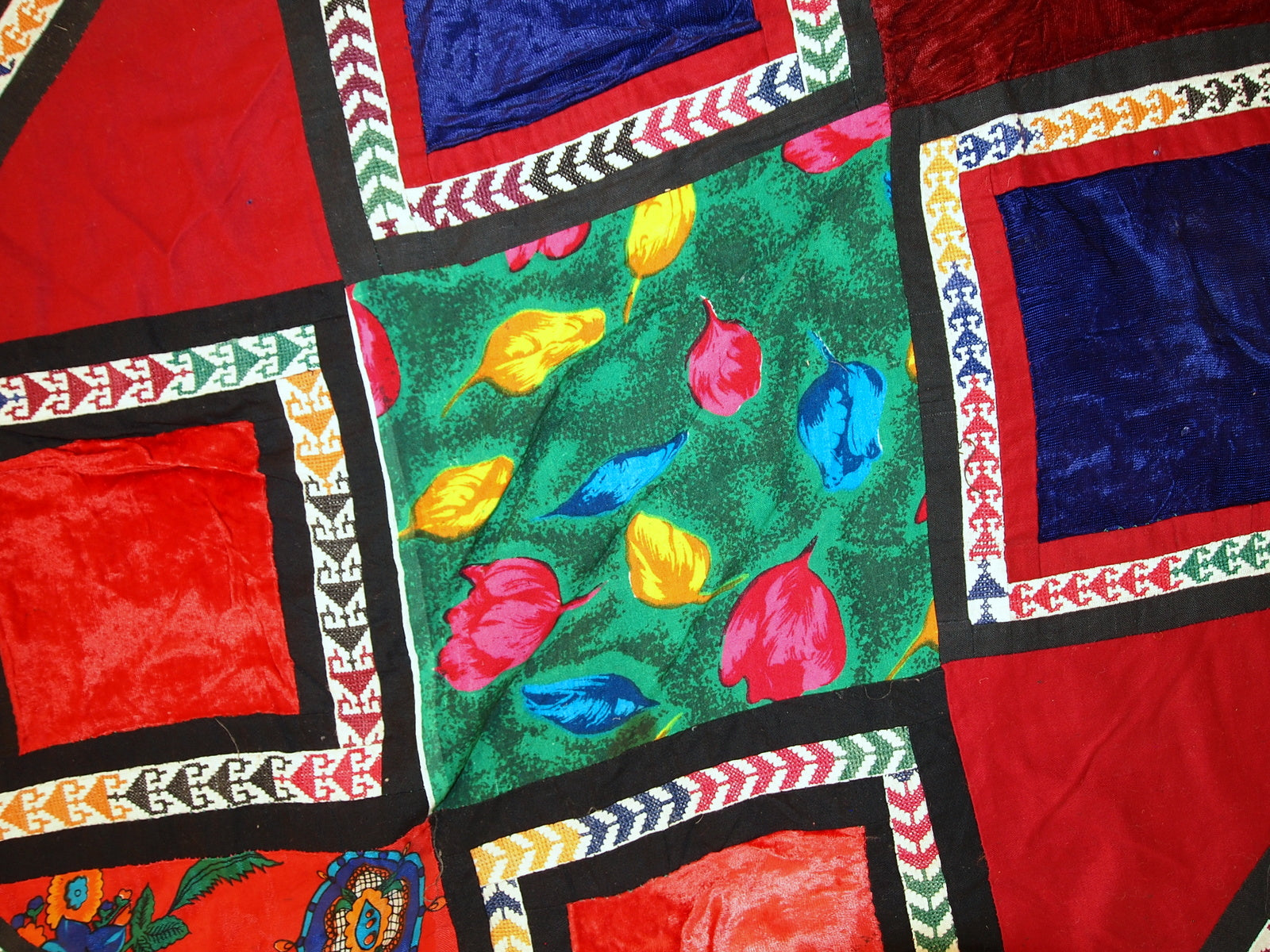 Color contrast between red base and colored patches

