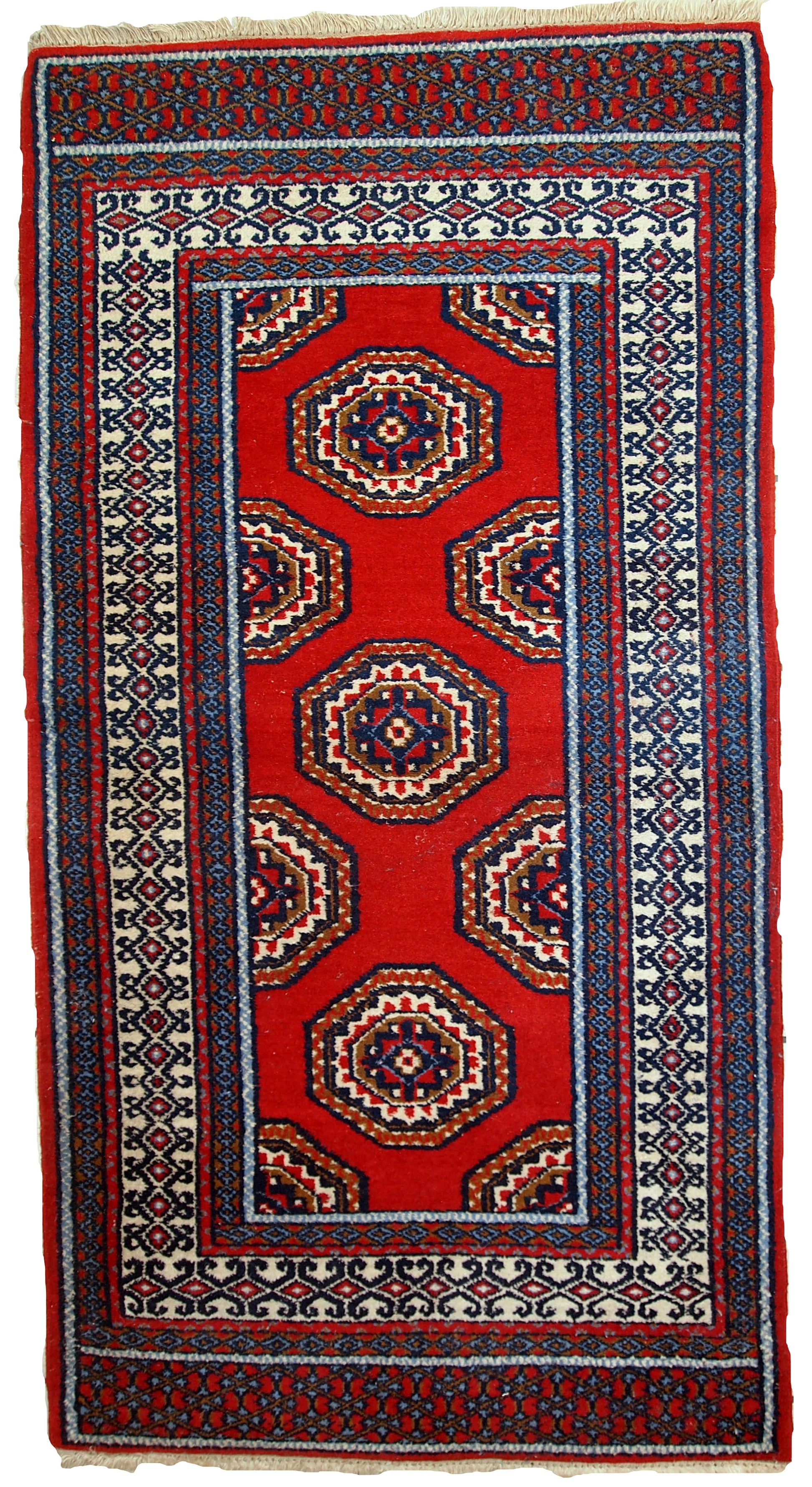 Handmade vintage Indo-Mahal rug featuring a deep red, blue, and white color palette.

