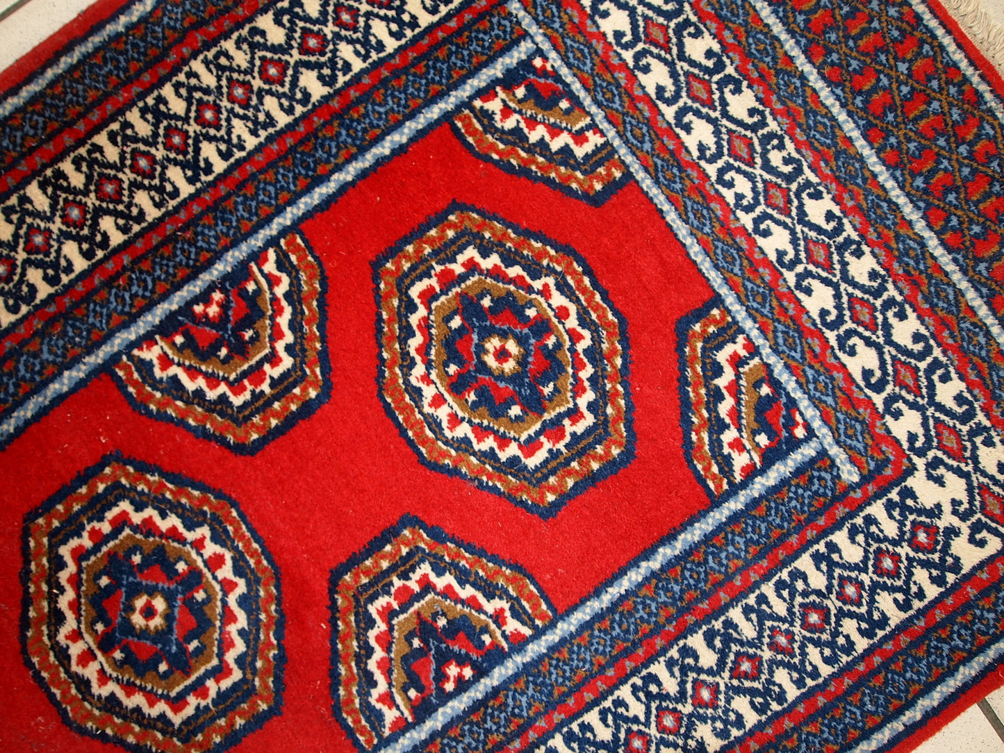 1970s wool Indo-Mahal rug showing intricate geometric designs.

