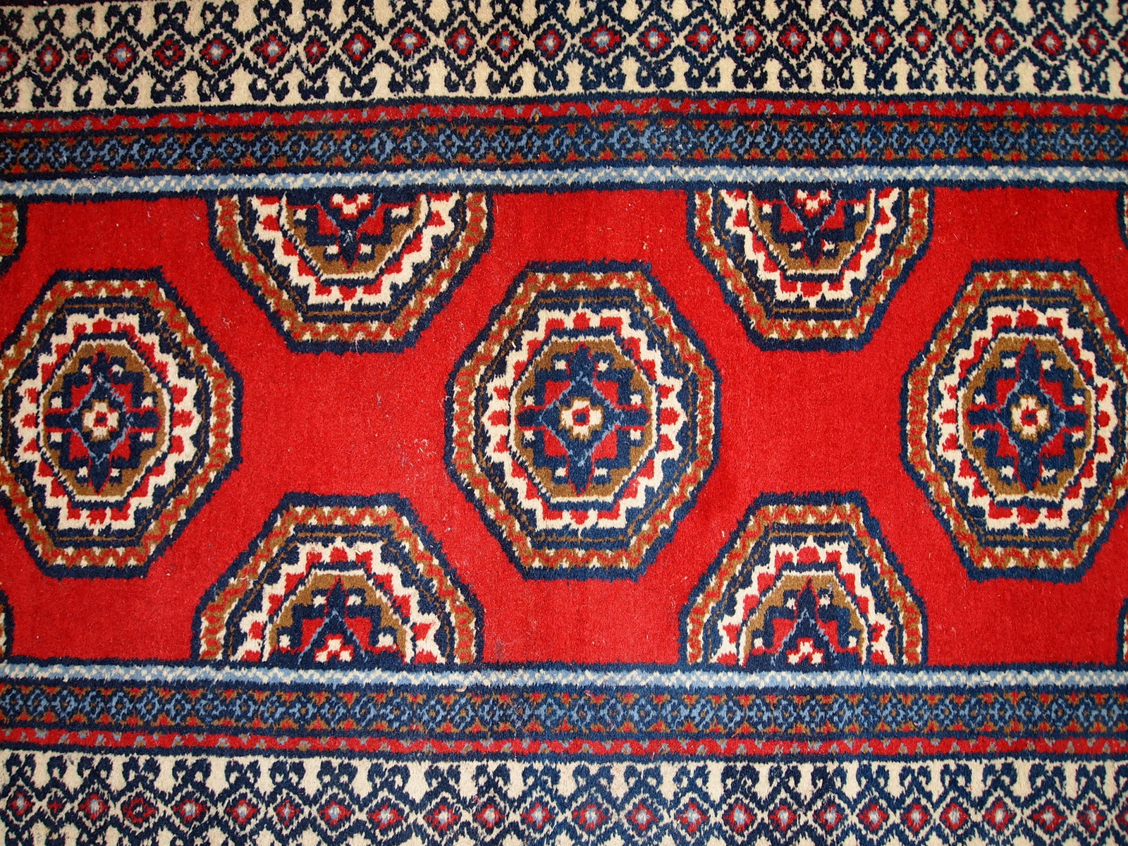 Vintage Indo-Mahal rug from the Middle East, featuring a traditional red and blue design.

