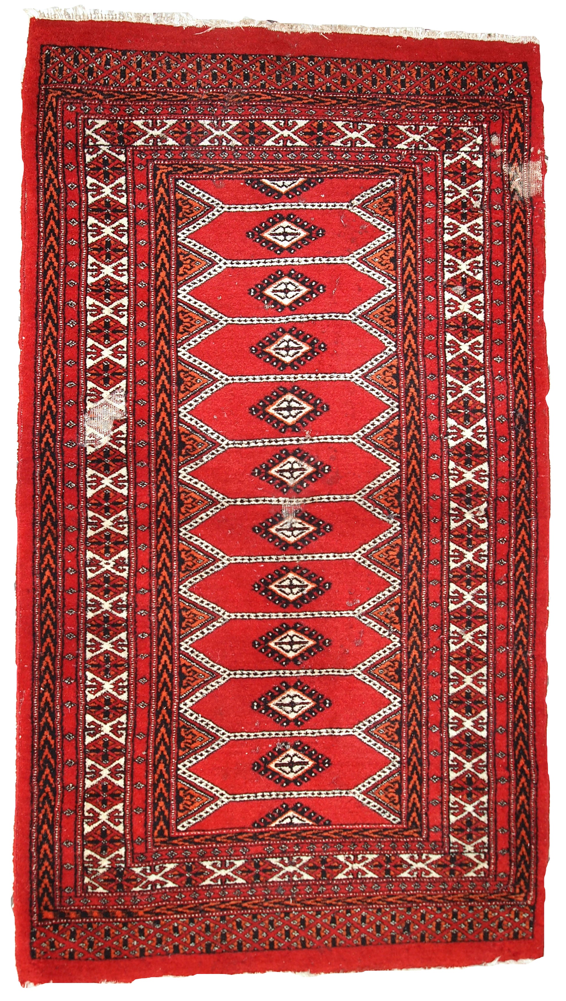 Handmade vintage Pakistani Lahore rug with distressed red wool and multi-colored patterns.

