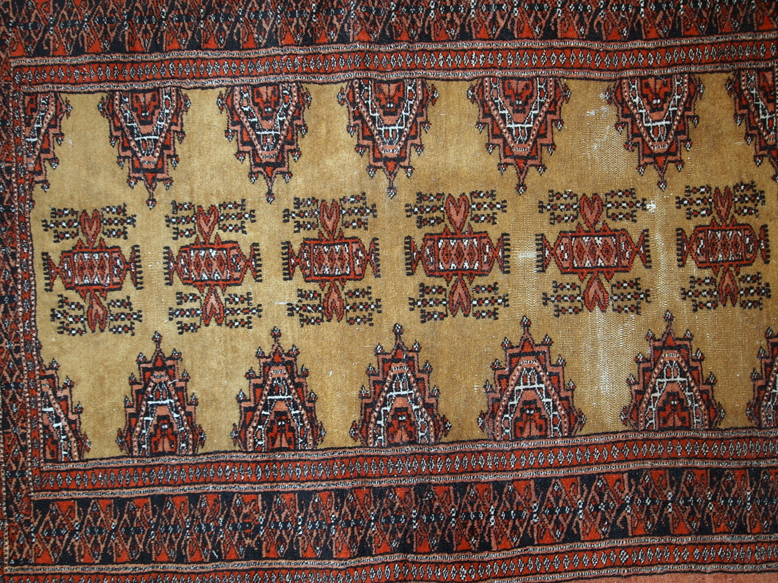 Full-length image of the handmade Bukhara rug, showcasing its 2.5' x 3.9' size.

