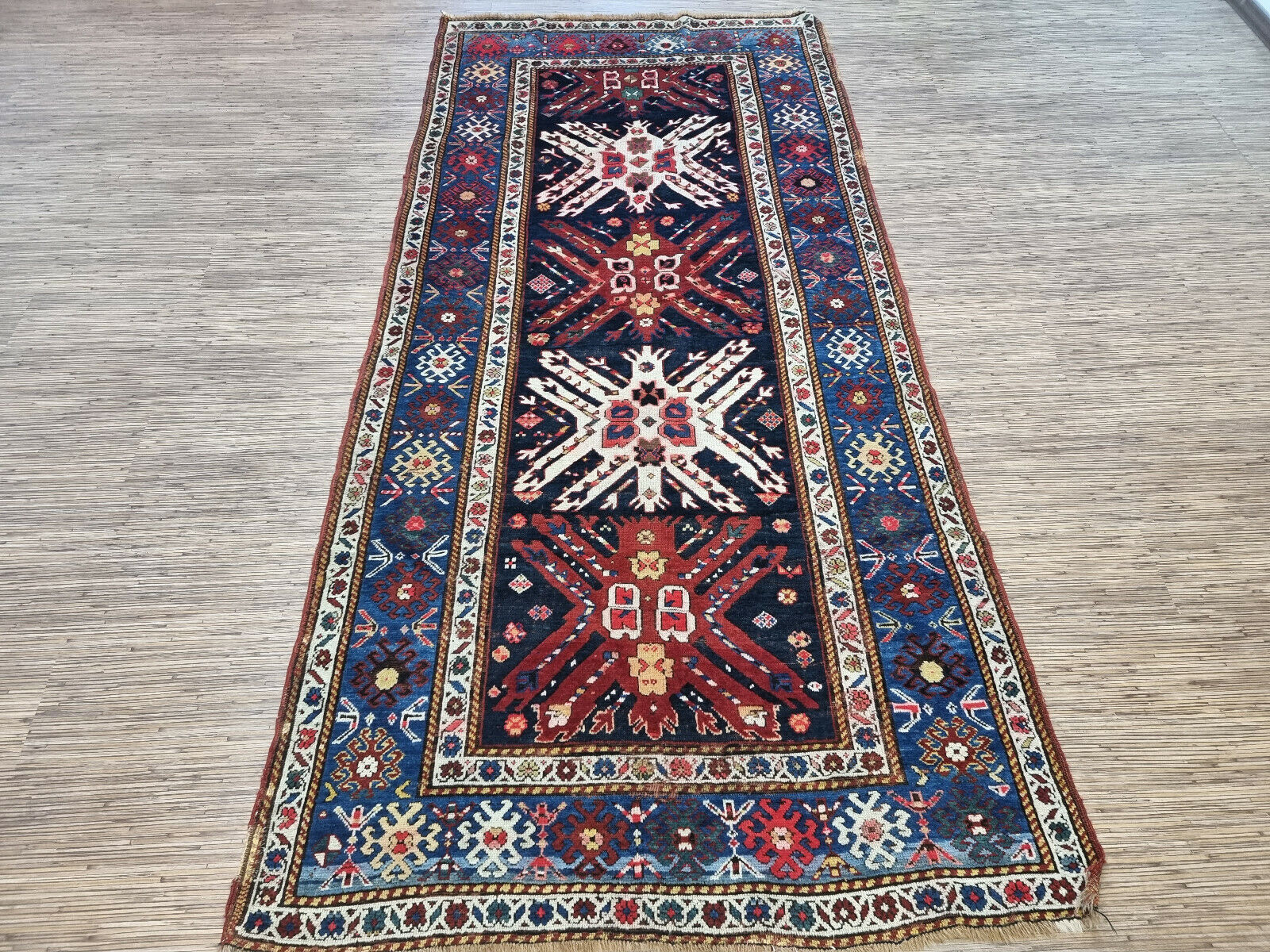 Full border design of the Handmade Antique Caucasian Kazak Rug
