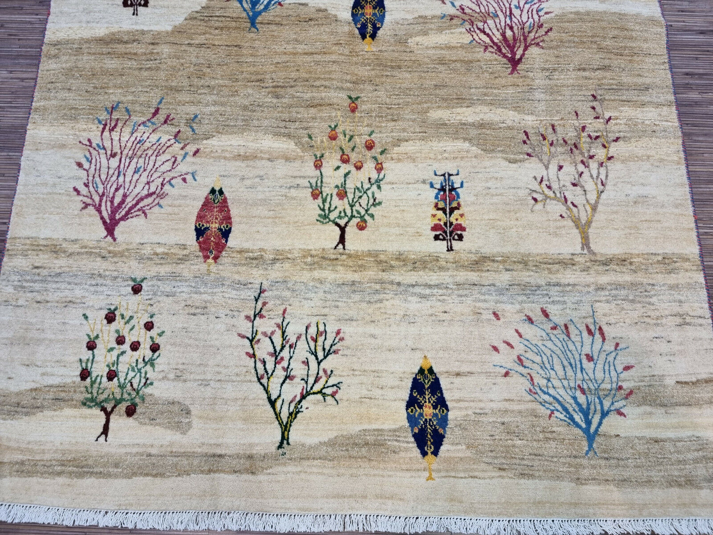 Symmetry and balance in the nature-inspired tree designs
