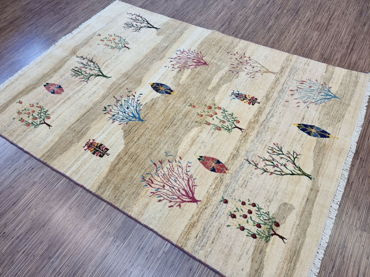 Full-length shot of the vintage Gabbeh rug in a modern room
