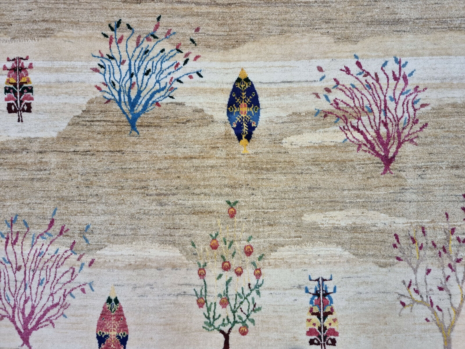 Close-up of the intricate weaving of the Persian Gabbeh rug
