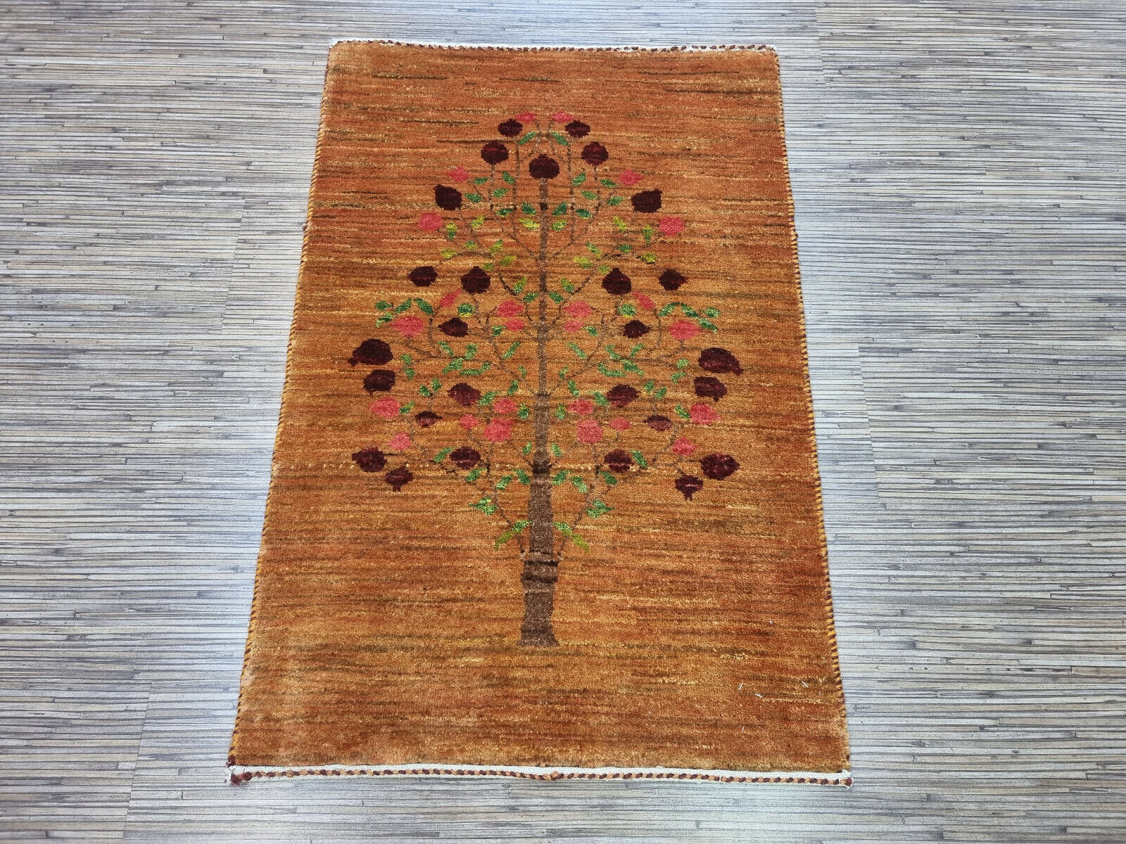 Persian wool rug featuring floral motifs

