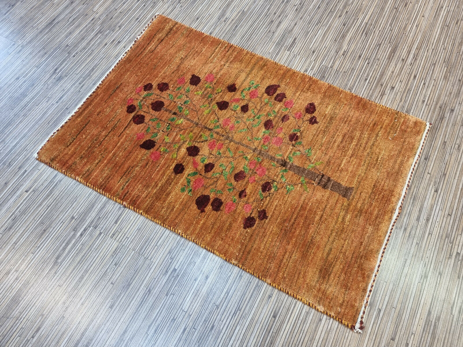 Vintage Persian rug with earthy brown tones
