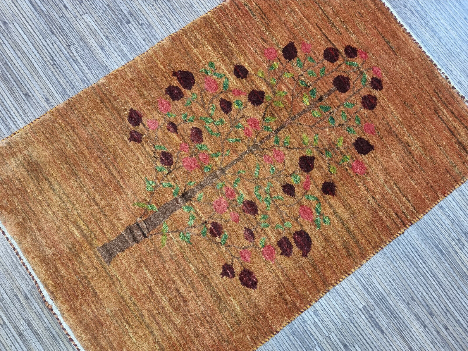 Persian rug corner showing intricate patterns
