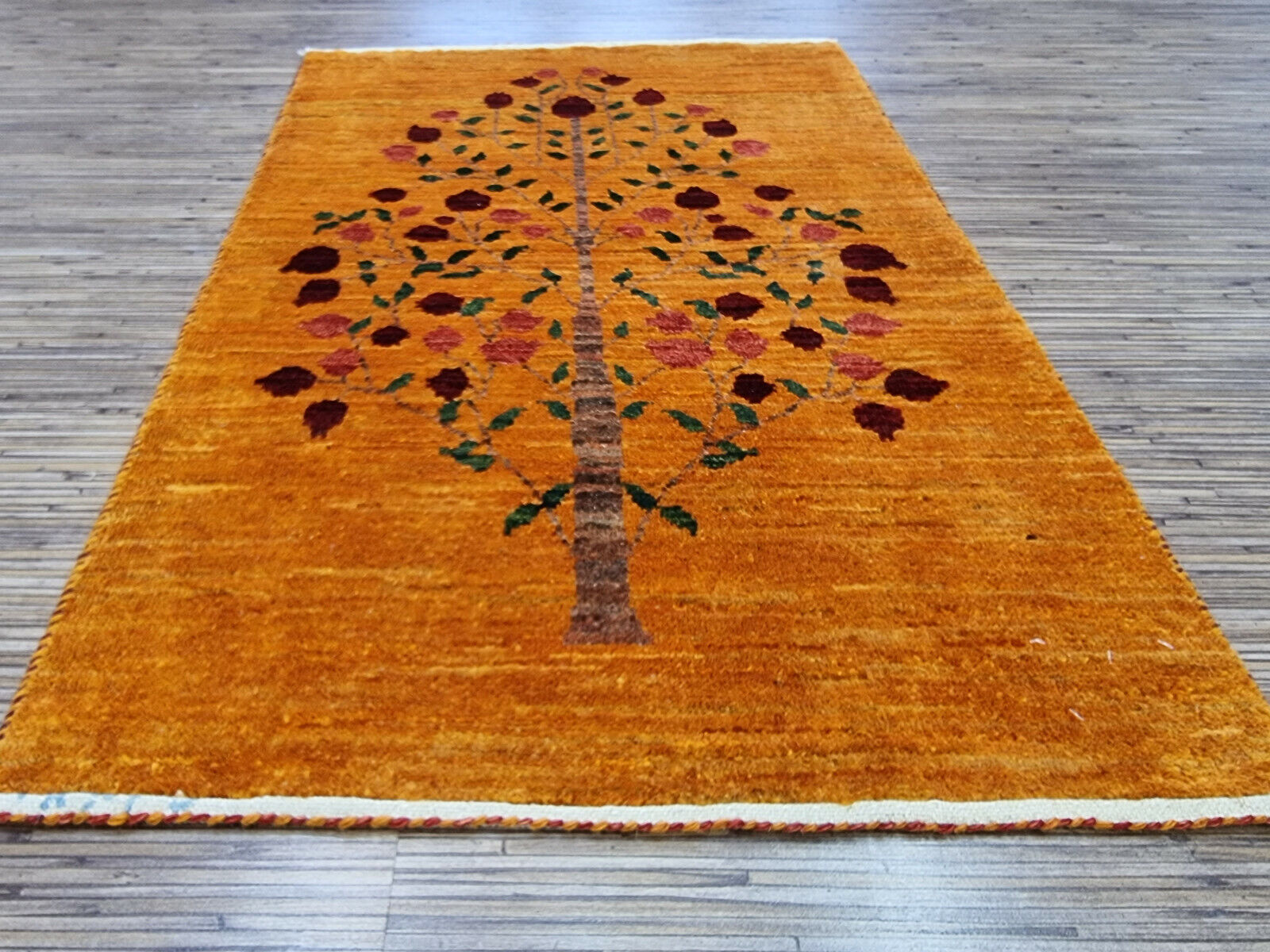 Persian Gabbeh rug showing hand-knotted craftsmanship
