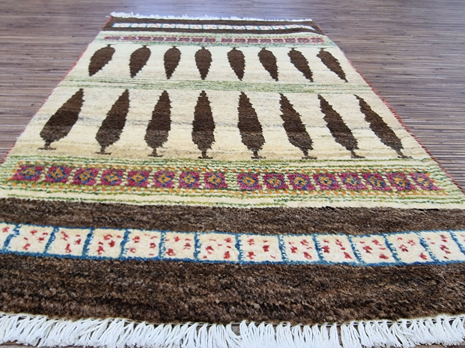 Persian Gabbeh rug styled in a living room setting
