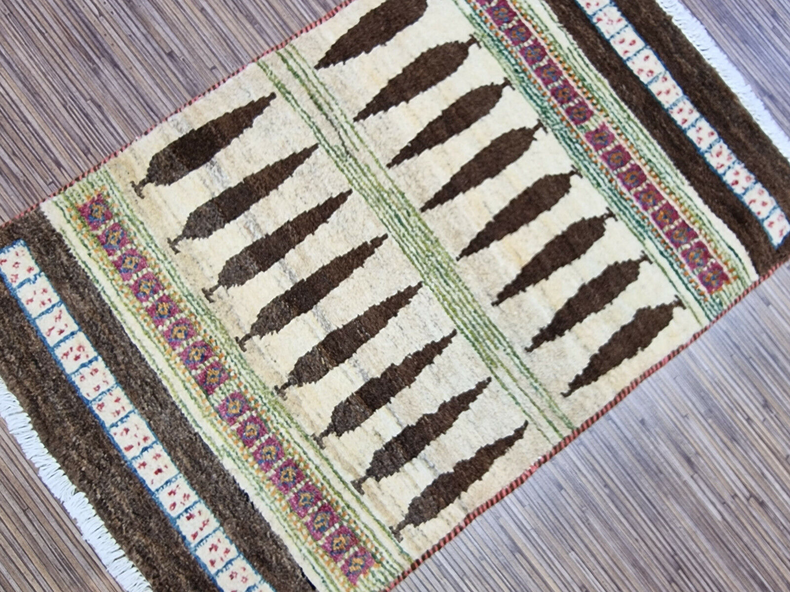 Backside of Persian Gabbeh rug showing cotton foundation
