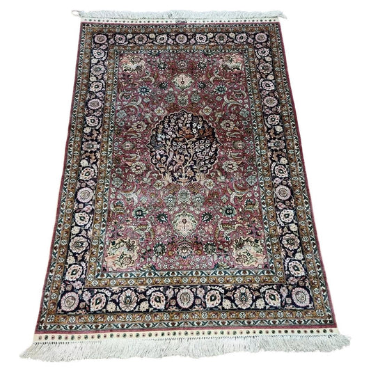 Handmade vintage Chinese Qum silk rug with floral design, full view.
