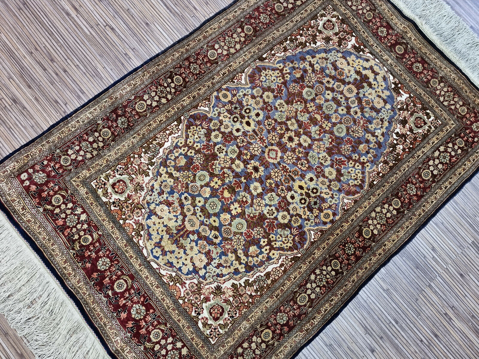 1980s Turkish silk rug with vibrant colors and soft texture.
