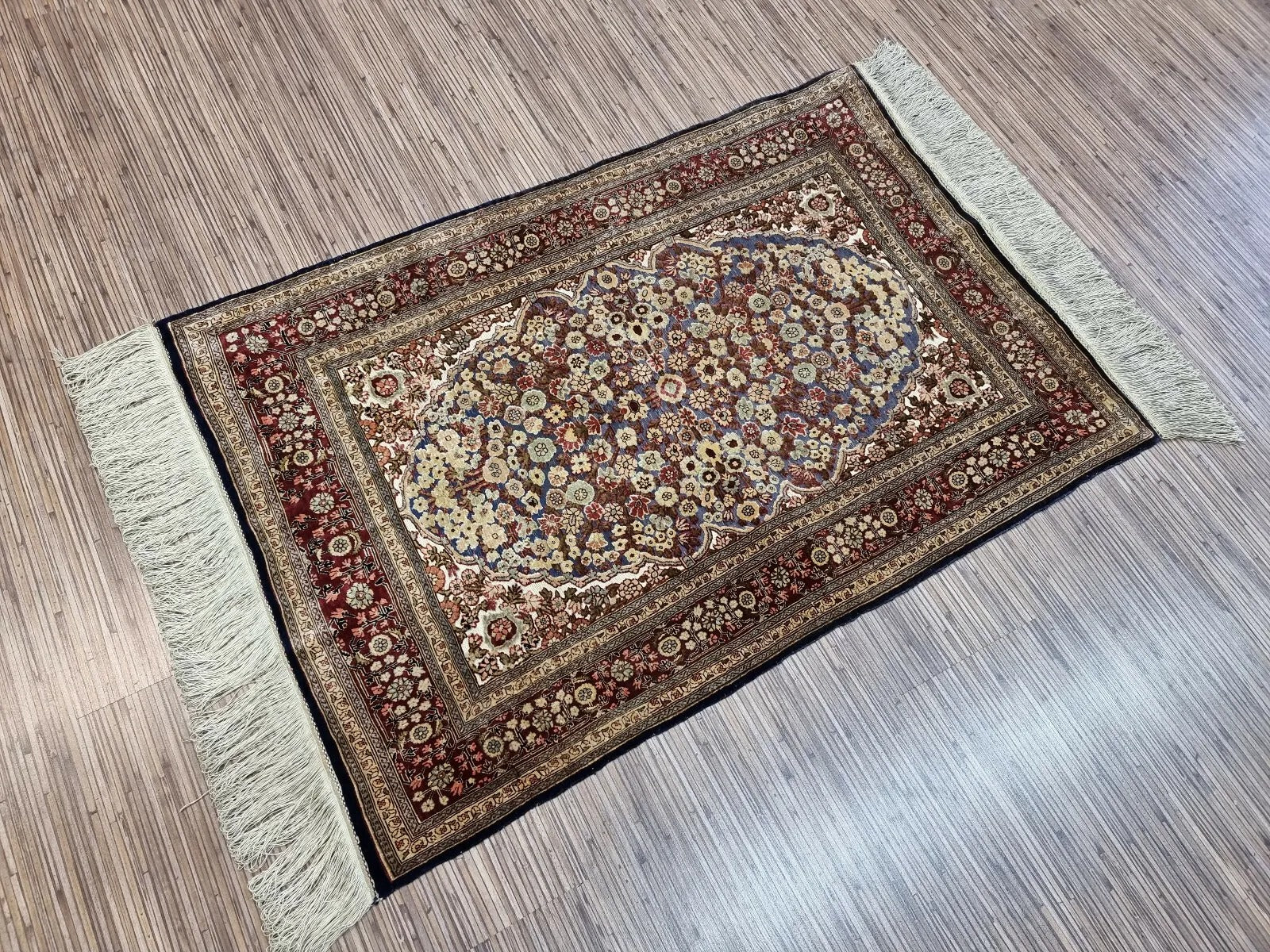 Turkish Hereke silk rug preserved in pristine condition for collectors.
