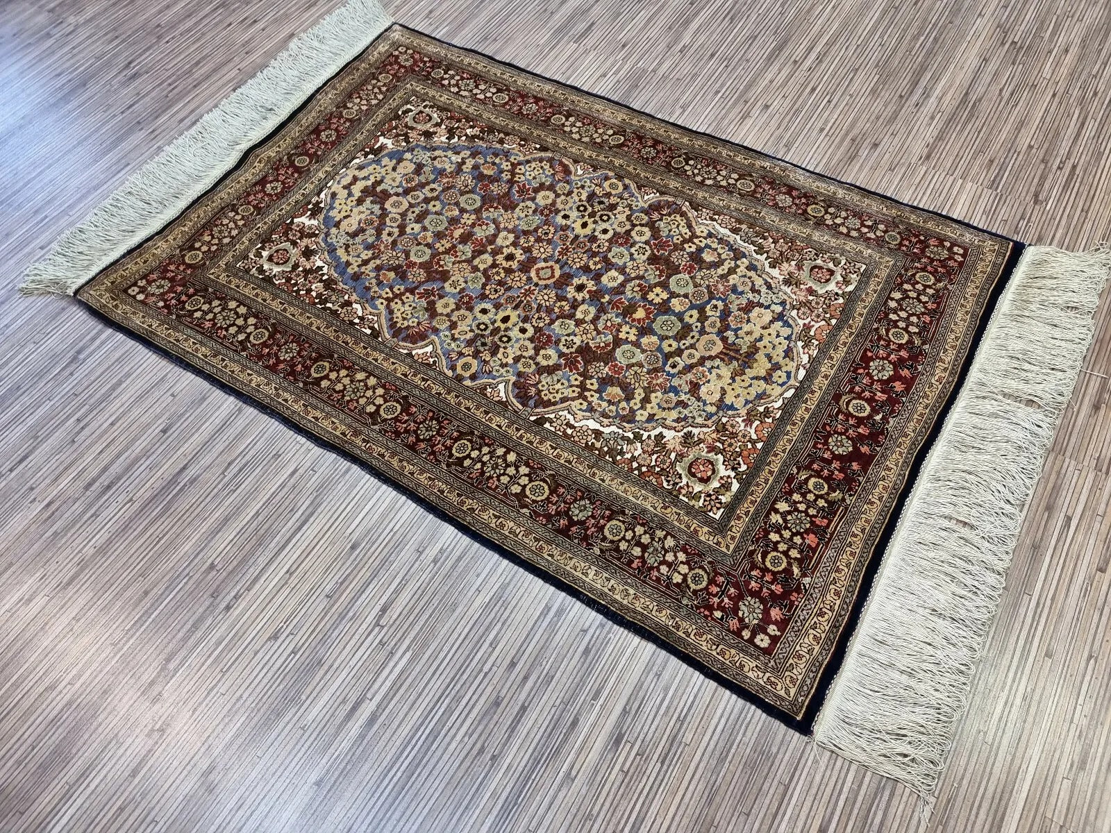 Soft and luxurious natural silk rug from Hereke, Turkey.
