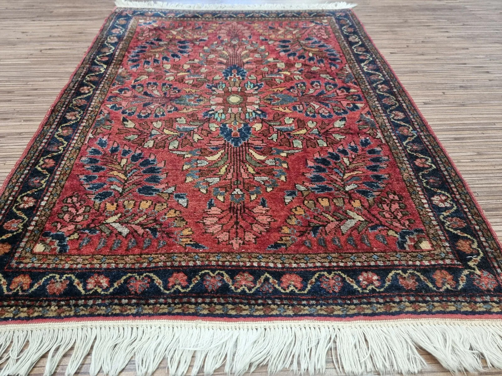 A zoomed-in shot of the borders, featuring traditional Persian detailing
