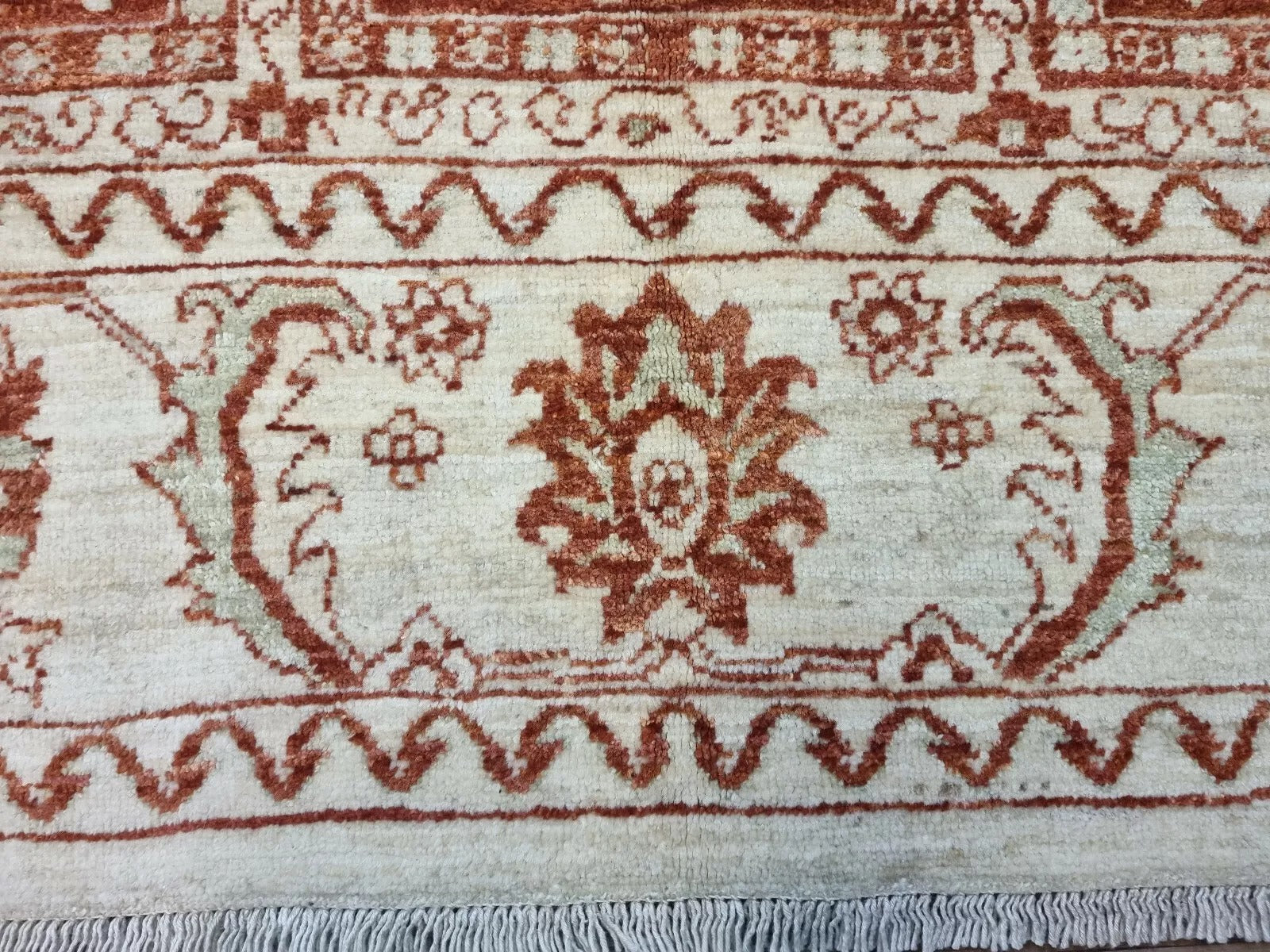 Ziegler rug with floral and geometric patterns
