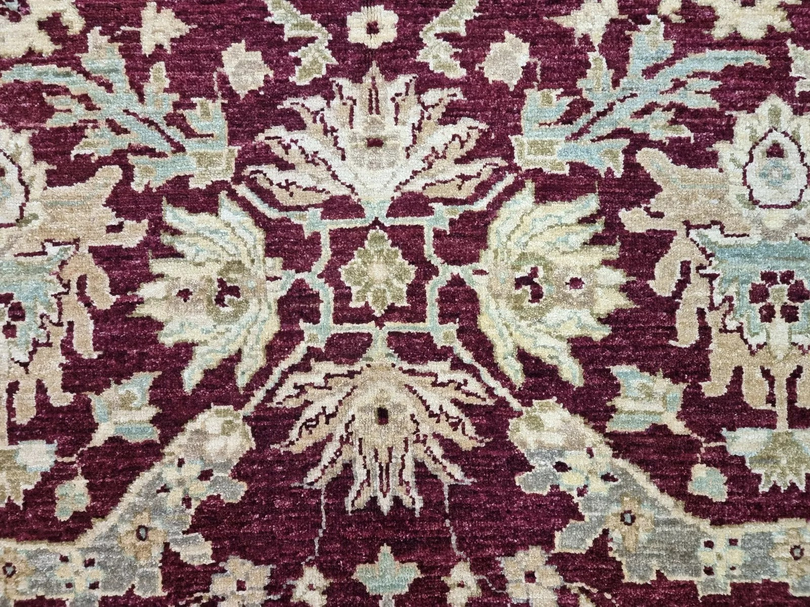 Afghan Ziegler carpet with central floral field

