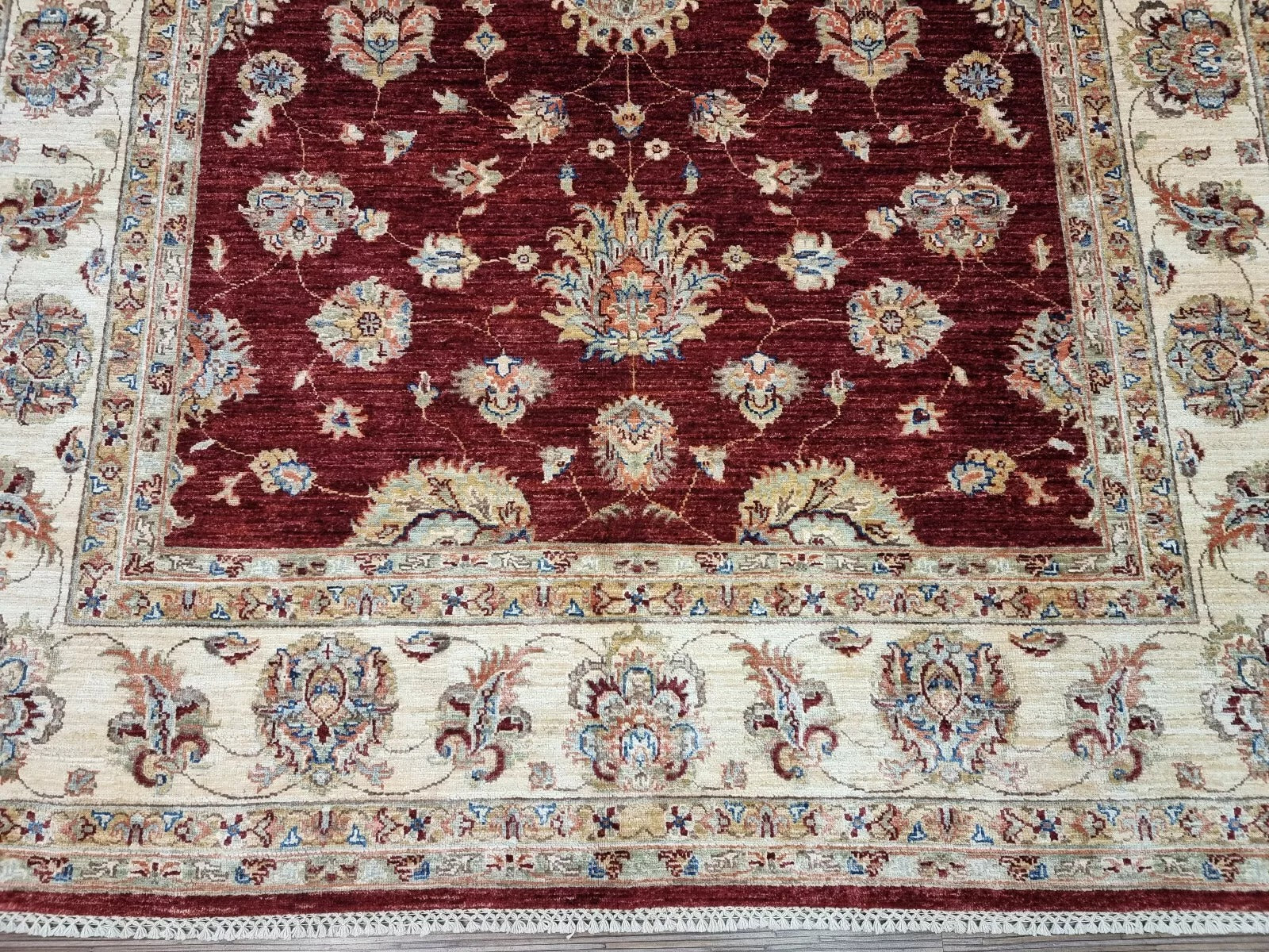 Wool floral rug in Sultanabad style from Afghanistan

