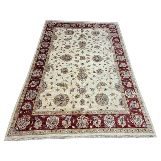 Vintage Afghan Zigler rug with floral design in red

