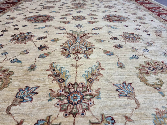 Handmade 1980s Afghan carpet with botanical motifs

