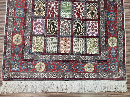 Handmade 1980s Qom silk carpet with detailed design

