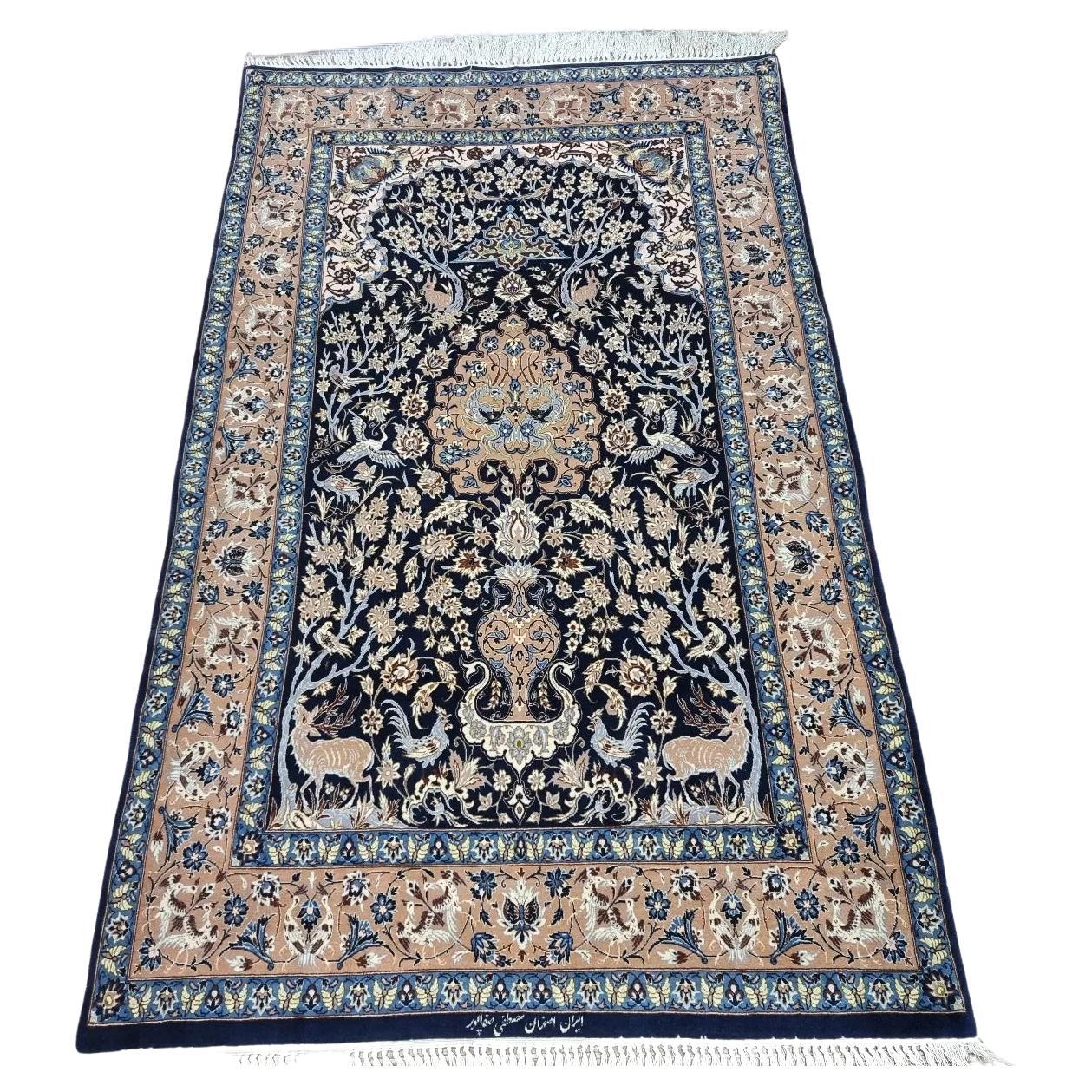 Full top view of the vintage Persian Isfahan prayer rug showing the complete mihrab design.

