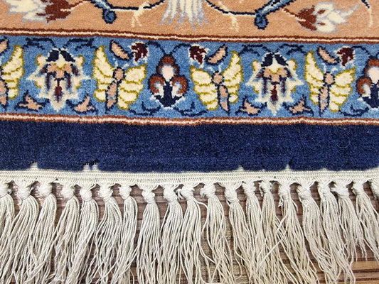 Close-up detail of the central prayer niche with its intricate floral patterns.

