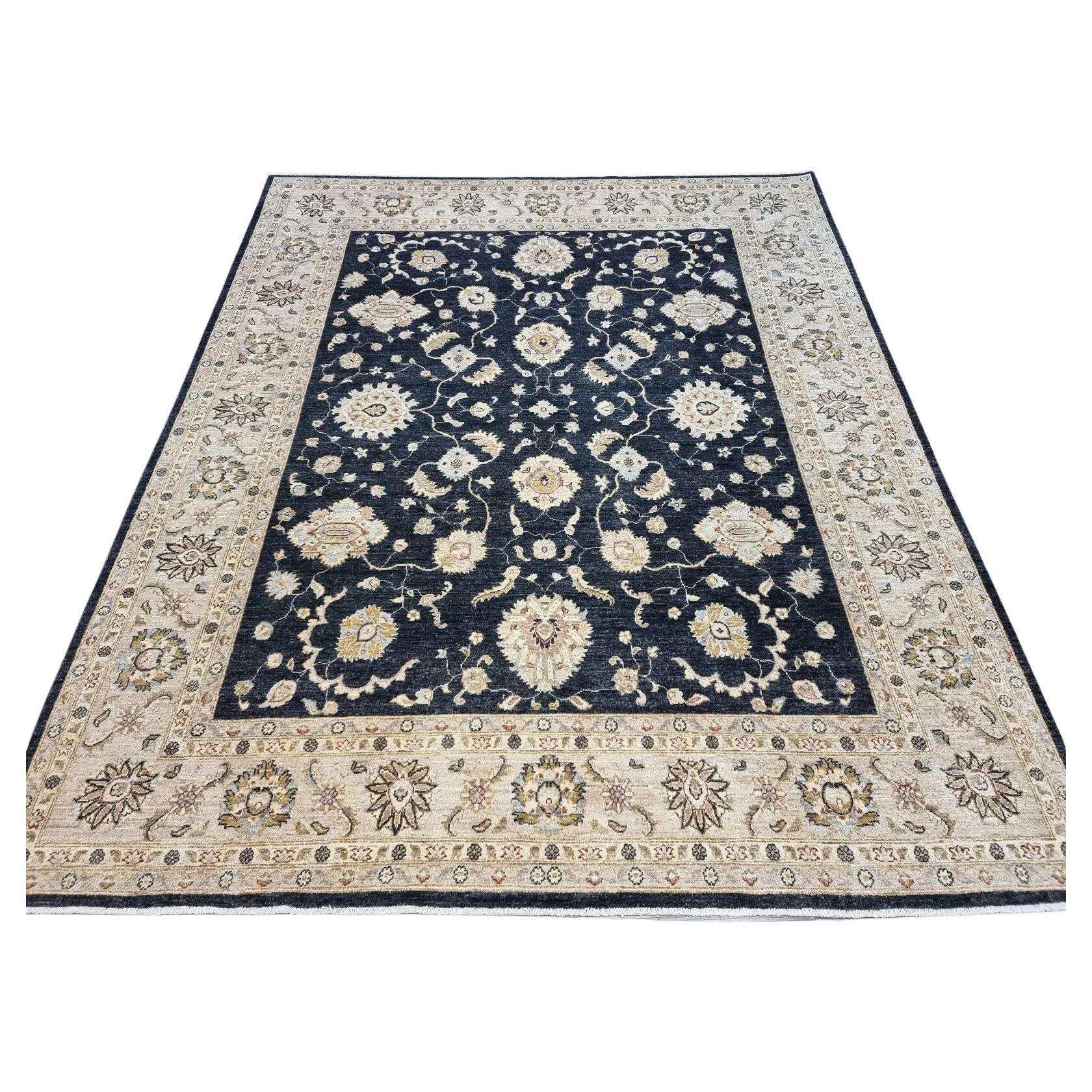 Full top view of the large vintage Afghan Zigler rug showing the complete all-over floral pattern.

