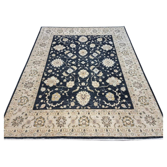 Full top view of the large vintage Afghan Zigler rug showing the complete all-over floral pattern.


