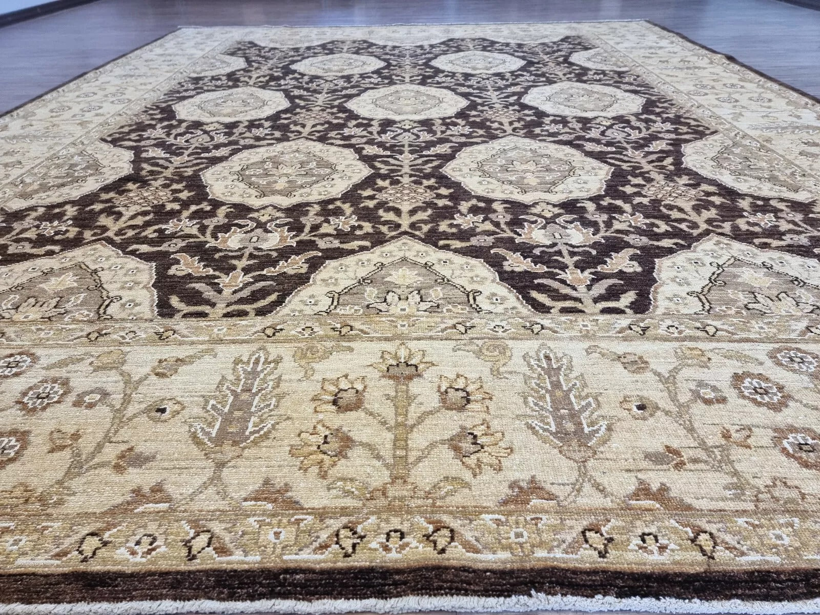 Angle shot capturing the expansive scale and luxurious presence of the rug.

