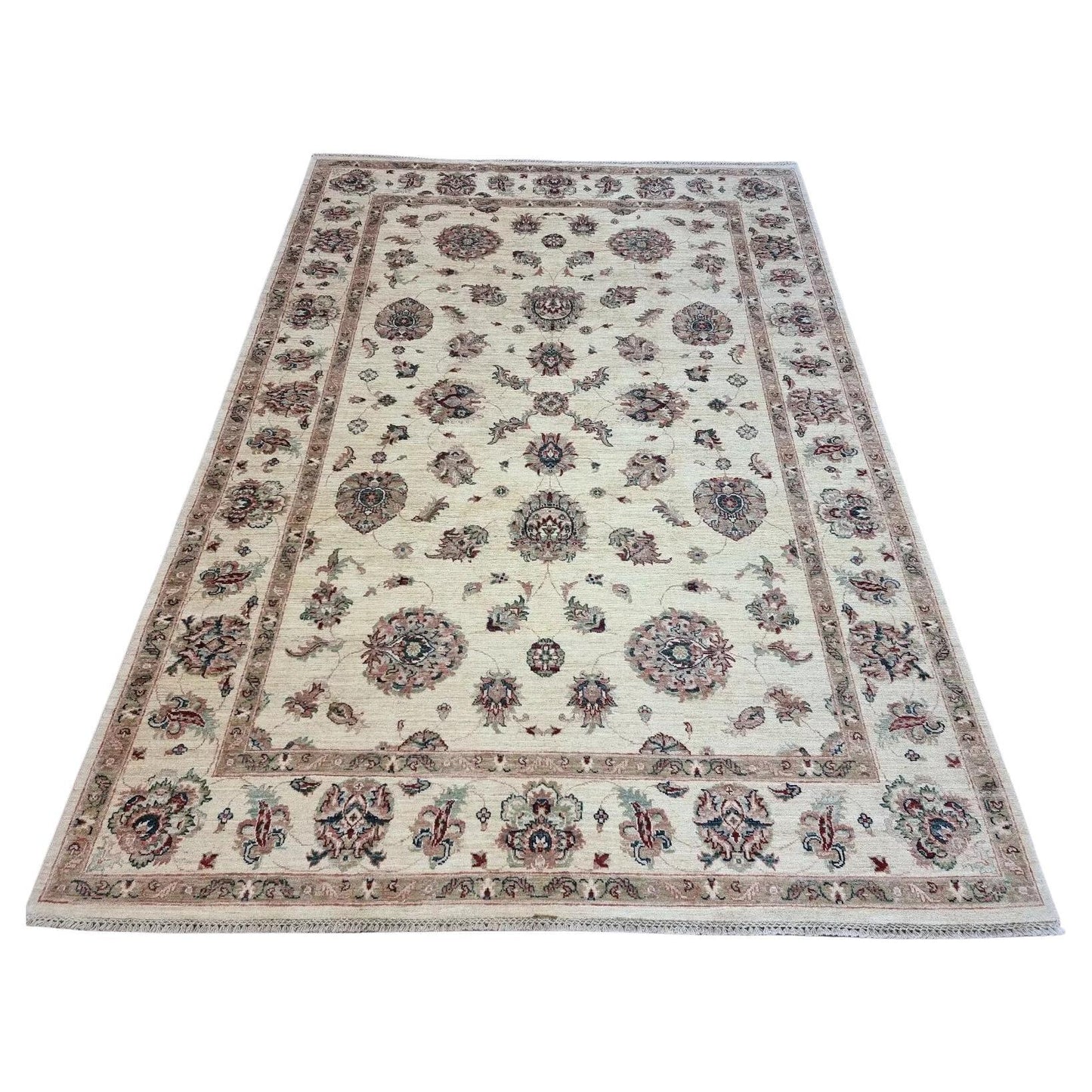 Full top view of the vintage Afghan Zigler rug showing the complete all-over floral pattern in beige.

