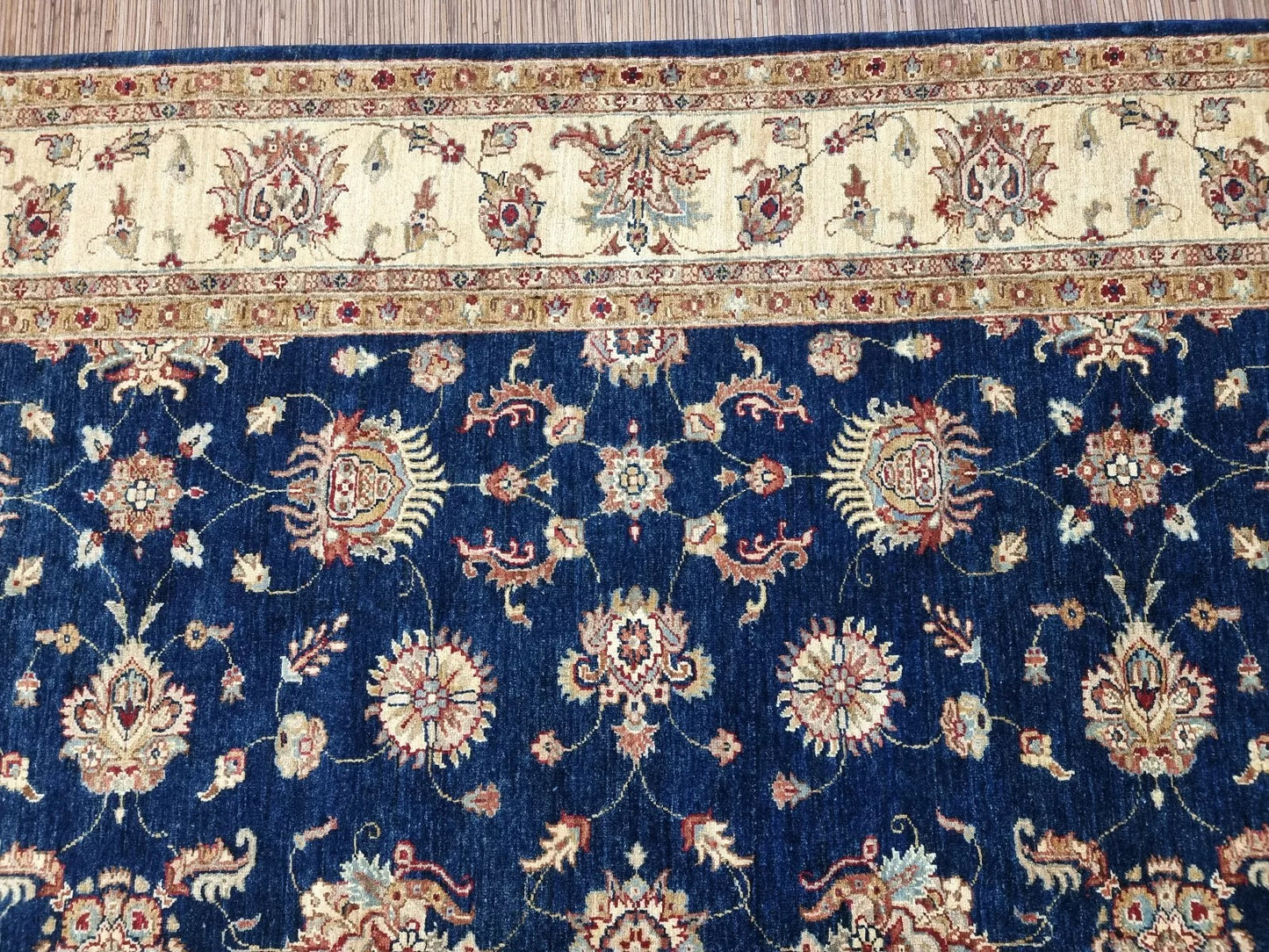 Detail of the rug's corner, displaying the seamless integration of the pattern.

