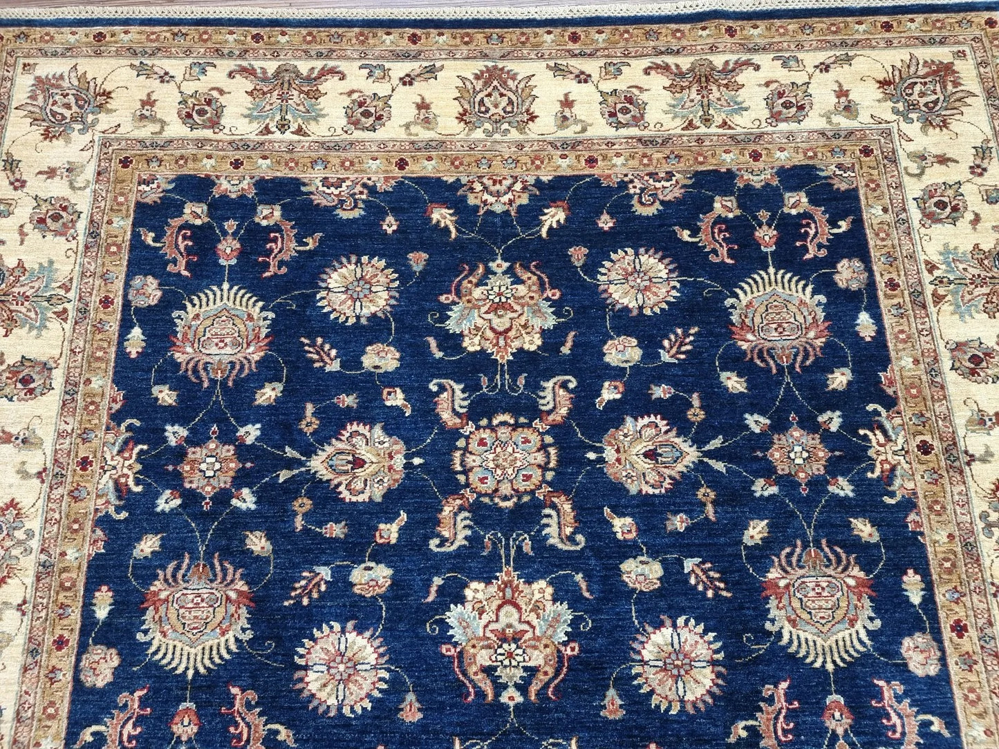Close-up of the precise hand-knotting showcasing the rug's dense and durable pile.

