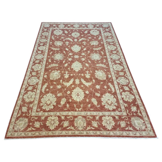 Vintage Afghan Zigler rug with terracotta color palette

