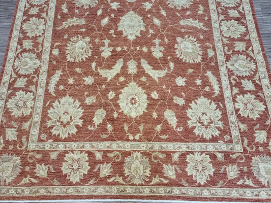 Oversized floral motifs on warm terracotta background

