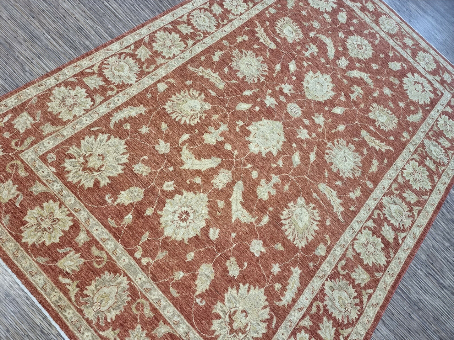 Close-up of intricate hand-knotted wool texture

