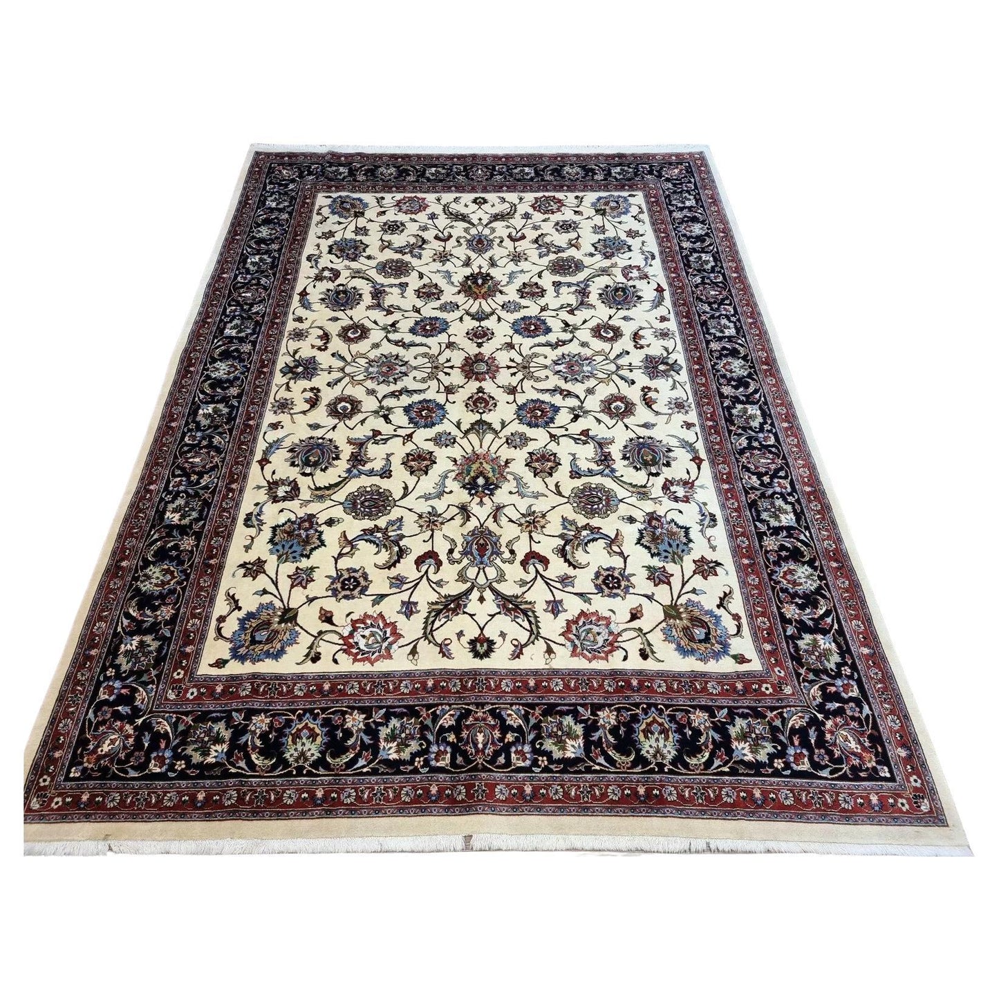 Full top view of the large vintage Sarouk rug showing the complete all-over floral pattern.

