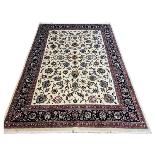 Full top view of the large vintage Sarouk rug showing the complete all-over floral pattern.

