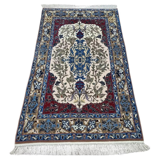 Full top view of the vintage Isfahan silk rug showing the central medallion design.

